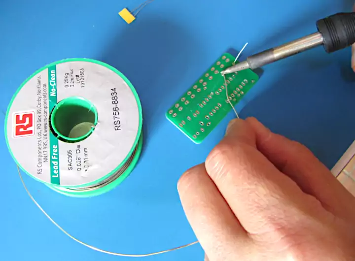Soldering a Resistor to the Running Light Kit Board